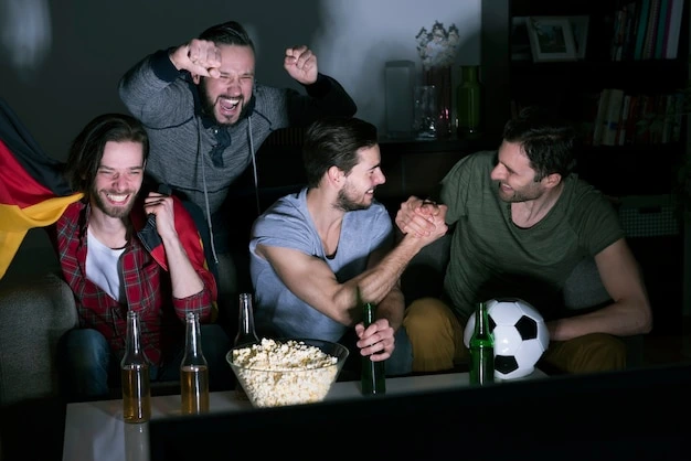 Friends enjoying live football together